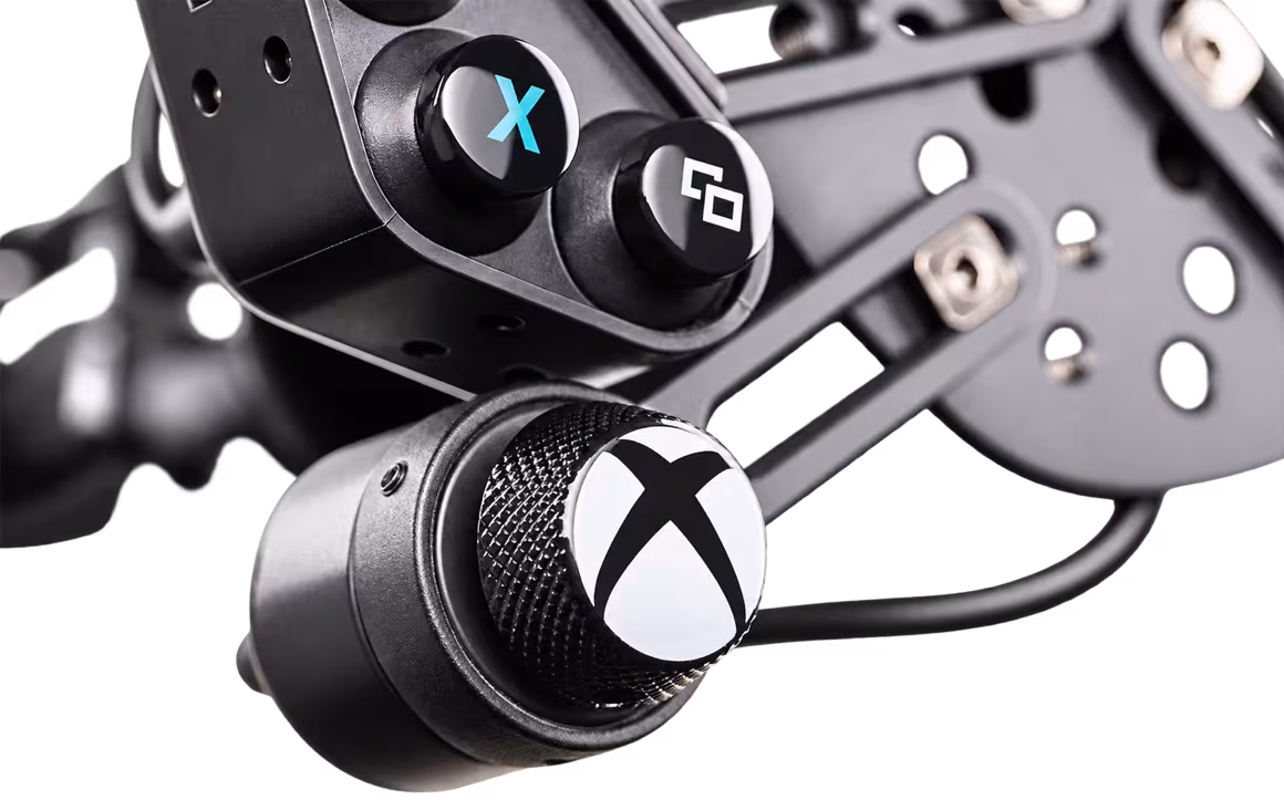 Xbox-branded FunkySwitch beside the ClubSport Universal Hub V2 button cluster